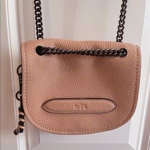 Coach rose pink colored leather mini bag with chain and leather strap